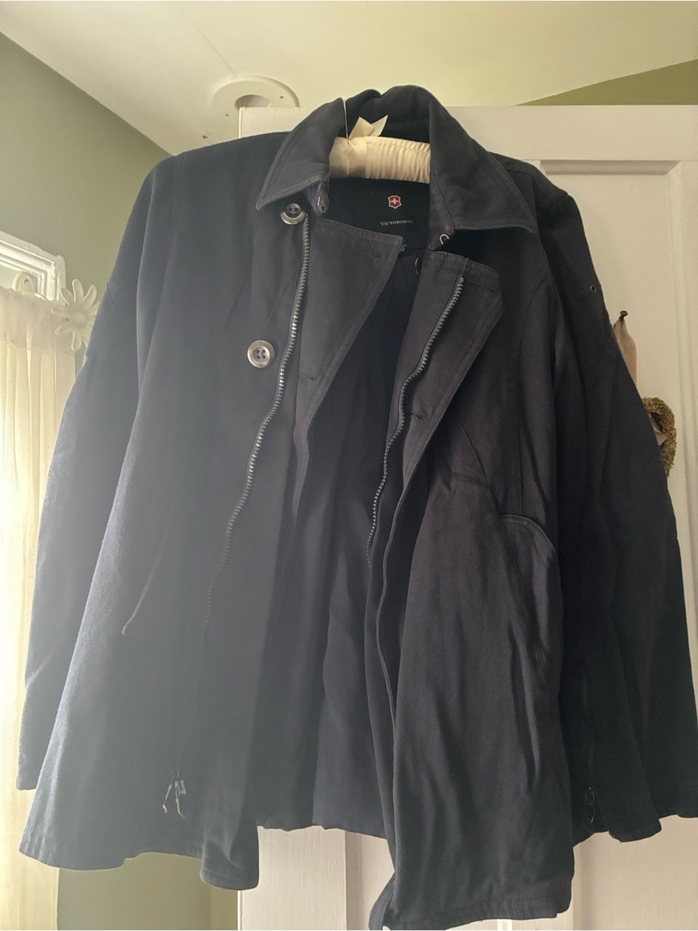 Victorinox women’s Black Coat with Zip-and-Button Front